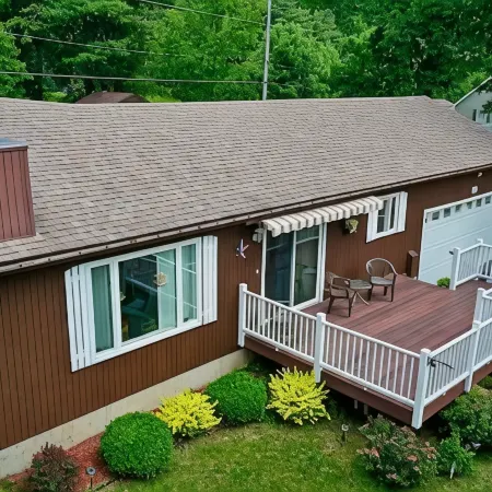 Cozy lake view home, centrally located with lake access and private dock!