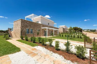 1664 Perla Saracena Luxury Suites - Appartamenti con Giardino by Barbarhouse Hotéis em Lido Marini