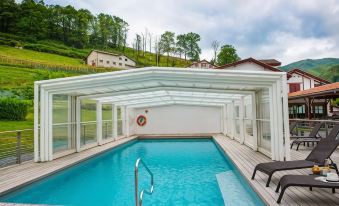 Logis Hôtel Andreinia & Cabanes