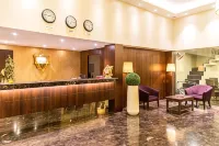 Treebo Premium Grand Emerald Hotels in Chinchvad
