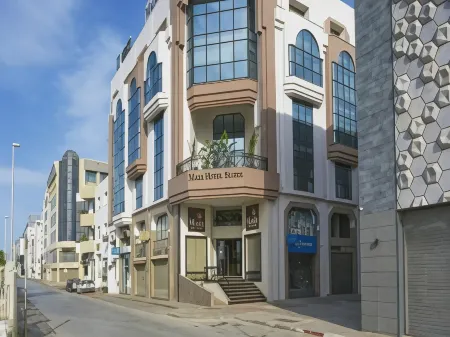 Maia Hotel Suites Отели рядом с достопримечательностью «Avenue Habib Bourguiba»