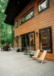 Modern mountain- inspired monoslope home located in the beautiful Northwoods
