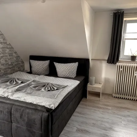 Cozy vacation apartment with a view of the Harz Mountains, near the center of Bad Harzburg Отели в г. Бад-Гарцбург