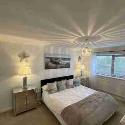 Beautiful Beach house sleep13, 5 mins to beach&Hot Tub, games room, pets allowed Rooms