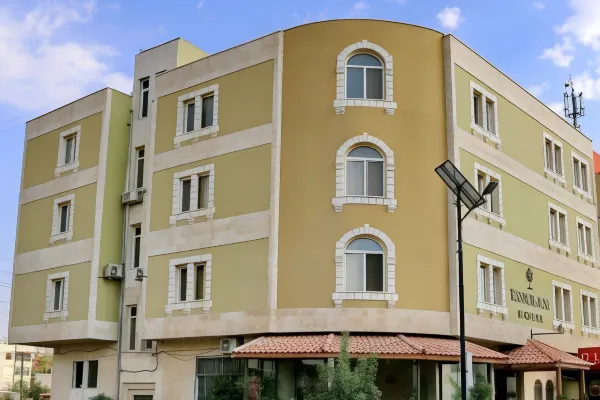 The welcoming exterior of Rumman Hotel in Madaba