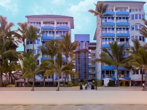 Cowrie Shell Beach Apartments Official