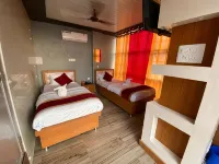 Hotel Kjs Inn Отели в г. 