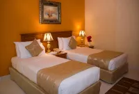 Al Maha Regency Hotel Suites - Managed by Aoudi Consultants Hotels near Petrofac International Ltd.