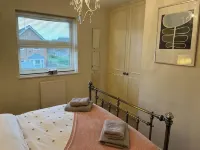 Cosy home in quiet cul-de-sac. Private fenced garden and free parking.