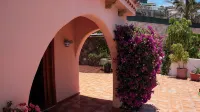 Luxury villa with private heated pool in private garden. Close to beaches.