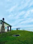 Lakeside Paradise! A charming blend of cozy comfort and beachfront bliss!