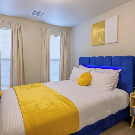 Four beds w/ 1 king, 3 queen beds each with a TV. Centrally located! No pets