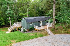 Romantic Luxury Lake Access Cabin w/ Hot Tub, Spacious Deck, and Pine Walls
