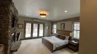 Luxurious Estate among the Pines w/ Hot Tub, EV Charger & so much MORE! - บังกะโล
