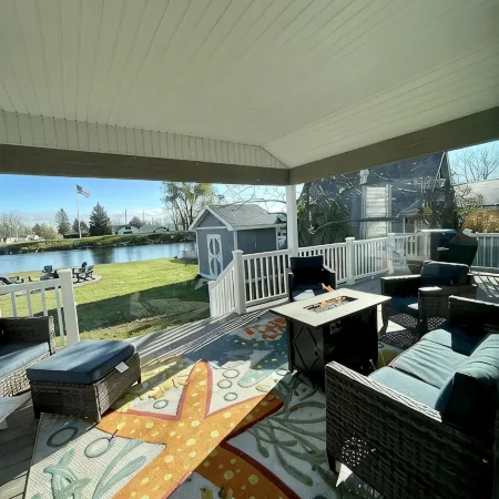 Cozy riverfront cottage with an easy beach-inspired coastal MI vibe!