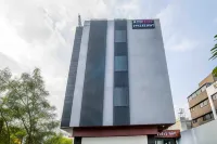 Aceotel Xpress Mint Hotels near Shiv Vatika Satellite junction- विश्वेश्वर सोशल वेलफेयर सोसायटी