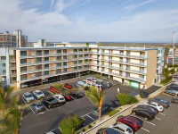 Coastal Palms Inn and Suites - Motels
