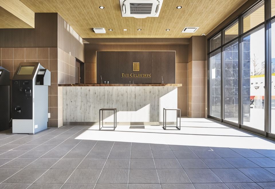 The Celecton Omiya 침대와 창가