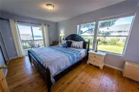 Cloud Nine - A Charming Ocean View Home with Hot Tub & Fire Pit in Belle Beach!