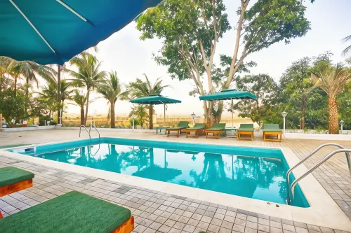 The Herb Farm Hotels in Bhavli Bk