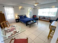 2Br near Coral Beach- Coconut Villa, hear the waves and relax!