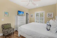 30A Beach Bungalow in Inlet: Steps from Sea, Pool with Golf Cart & Cruiser Bikes