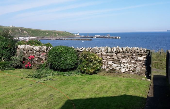 Bungalow with sea-view, near small town of Thurso.