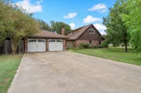 Beautiful Tudor Style home centrally located, and packed with amenities!