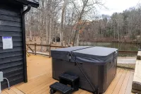 Secluded Cabins on Private Stocked Pond Hot Tub. Ping Pong. Arcade. Master Suite