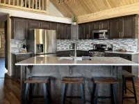 Beautiful hand-crafted log cabin on Horse Creek one block off Main Street.