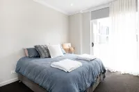 Coastal setting minutes from beach and shops