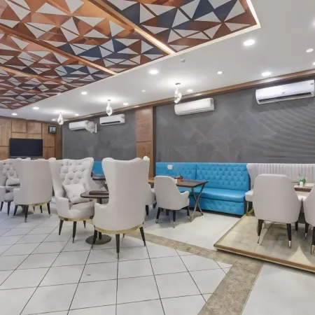 Status by Hotel the Emporio