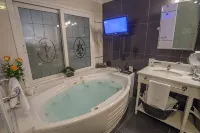 Hotel Villa Morra Suites - ที่มีอ่างอาบน้ำ
