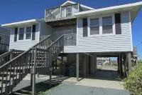 Just steps to the beach, bar, and playground park! - 2-Star