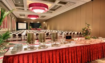 a large banquet hall with tables set up for a formal event , including food and decorations at Golden Nugget