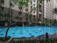 Minimalist 3Br Gateway Cicadas Ahmad Yani Apartment by Travelio - Homestays