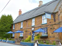 The Marquess of Exeter Отели в г. 