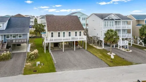 Comfortable, bright and sunny beach house.  Steps away from beach access.