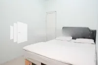 Happy Inn Puspo Mitra RedDoorz