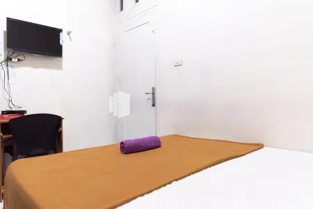 Wisma Aini Syariah Mitra RedDoorz Отели в г. Way Dadi