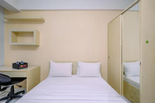 Simple and Cozy Living Studio at Dramaga Tower Apartment By Travelio