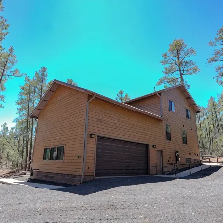 OASIS IN THE FOREST ON 1.25 ACRE BACKING TO NATIONAL FOREST WITH AC-PETS WELCOME