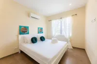 Charming 2Br Apt with Tropical Garden Pool Hotels in Soto