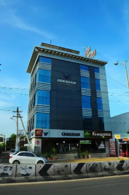 Hotel Varshan International Hotels near Chennimalai Murugan Temple