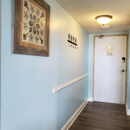 Cozy Beach Condo with Private Beach, Heated Pool, High Speed WiFi, and More.
