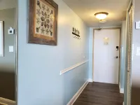 Cozy Beach Condo with Private Beach, Heated Pool, High Speed WiFi, and More.