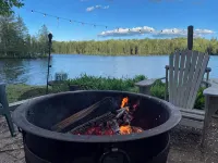 Cozy Adirondack cabin with private dock and kayaks, feet from Adirondack Lake