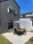Warm and stylish new home close to river, lake, restaurants and golf course.