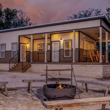 Tranquil Lakefront Retreat: 1BR Cabin with Covered Patio & Private Dock