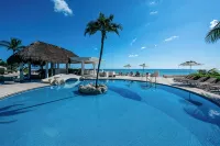 Beachfront 3b ground-level condo with stunning Caribbean Sea views in Playacar 1
